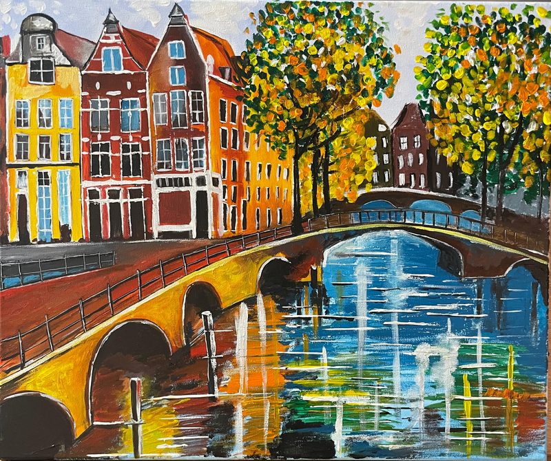 Amstel Gold by Deepti Dasika: Amsterdam canal in autumn: gabled canal houses, arched bridges and dabbed orange-yellow trees reflected in streaked blue water.